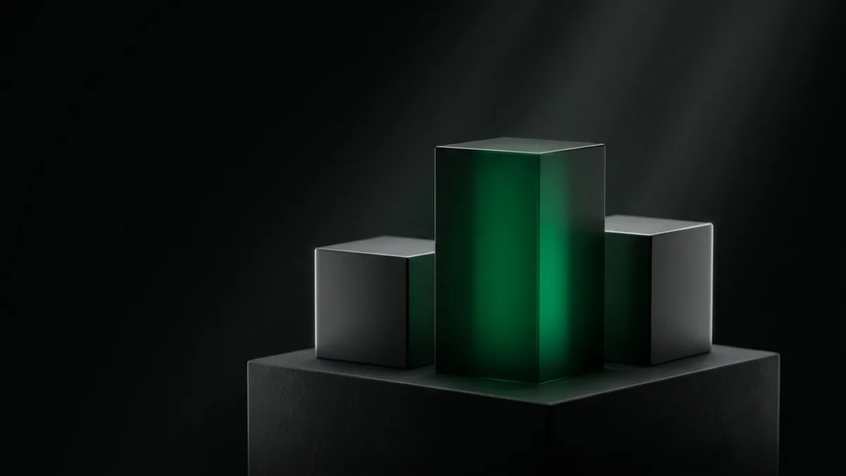 Archetype 3 (architectural still life): a sculptural arrangement of three matte-black geometric blocks on a dark plinth lit like a museum exhibit, one tall central block glowing vivid emerald green #22c55e from within, the other two dim grayscale, deep shadows, subtle volumetric light, no text, no people